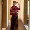 Camiseta de manga larga para mujer de principios de otoño, nuevo diseño 2026, conjunto de top tipo polo de punto a rayas rojas y pantalones