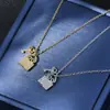 Chapado en oro real cadena para clavícula de temperamento diseño de nicho femenino sentido de la moda llave candado de larga vida collar personalidad cadena para el cuello simple joyería