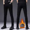 Jeans negros de alta gama italianos que no se decoloran para hombre, pantalones casuales ajustados elásticos de estilo coreano para otoño e invierno