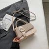 Bolso de mano texturizado de moda para viajeros, nuevo bolso de hombro de estilo occidental versátil de estilo coreano para principios de otoño de 2023, bolso cuadrado pequeño de moda