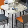 Conjunto de mesa de comedor y sillas de losa de roca de moda, diseño minimalista moderno, adecuado para apartamentos pequeños, mesa de comedor redonda o cuadrada, mesa de recepción de alta gama y lujosa