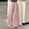 Pantalones de chándal para niña Primavera 2026 Nuevo estilo Niños grandes Casual Deportes Pantalones de plátano Primavera Verano Modernos Versátiles Pantalones de pierna ancha