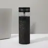 Taza aislada de titanio puro de doble capa, para uso doméstico, con diseño de separación de té y agua, una taza de titanio de alta gama adecuada para entornos de negocios, empaquetada como juego de regalo, una taza de titanio lujosa para regalos de negocios