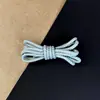Venta al por mayor de fábrica Botas Baojie Zapatos de cuero Cordones para zapatos Botas militares Zapatos de caña alta Redondo 4.5 mm Poliéster Tejido Color puro Zapatos
