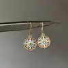 Brincos de óleo estilo medieval de jardim de Monet para mulheres novo estilo estilo quente temperamento de luxo leve estilo de dama de alta qualidade brincos de temperamento