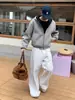 Sudadera tipo cárdigan pesada transfronteriza para hombre, nueva sudadera con capucha de color liso para primavera y otoño 2026, chaqueta holgada estilo americano con bloques de color