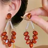 Aretes de aguja plateada con diamantes, borlas geométricas de perlas, ultra brillantes, lujosos y exquisitos, personalizados y elegantes, aretes de alta gama
