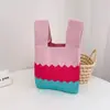 Inventário processamento de baixo custo quadra inteira versão japonesa e coreana de bolsa de mão casual para todas as estações bolsa de ombro celebridade da internet feminina de tricô