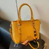 Bolso de mano de moda transfronterizo para mujer, nuevo modelo de verano 2026, bolso tipo cesta texturizado de alta calidad, bolso versátil de hombro y cruzado