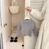 Ropa de otoño para niñas estilo coreano, suéter con lazo fruncido de cuello semi-alto, top de punto para bebé con mangas acampanadas de encaje para primavera y otoño