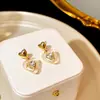 Pendientes de Perla Coreanos de Alta Gama 2026, Aguja de Plata Estilo Vintage Chanel, Diamante Multicolor Estrella de Ocho Puntas, Pendientes de Botón, Venta al por Mayor