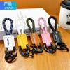 Tendencia creativa tejido PU cuero hebilla herradura hecho a mano piel de vaca llavero colgante simple para hombre y mujer cordón para teléfono móvil