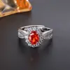 Transmissão ao vivo venda imperdível: Anel de cristal de pedra preciosa em formato de ovo redondo de coco imitação para mulheres, estilo nicho, cheio de diamantes, versátil e elegante, anel de diamante de alto carbono