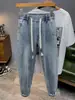 Calça Jeans Reta Masculina, Nova Versátil Solta Casual Cintura Elástica Cordão Tendência Calça Masculina 2026 Estilo Jovem