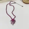 Collar y pendientes de borla exagerados de diamantes completos de alta resistencia europeos y americanos, lujo ligero, moda de alta gama, joyería de diseño vintage de nicho para mujer