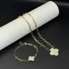 Conjunto de Pulsera y Collar de Zirconia Micro-Pavimentada con Trébol de Cuatro Hojas y Camelia Joyería Estilo Europeo y Americano Lujo Ligero Venta Caliente Transfronteriza