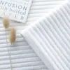 Tela de chenilla para sofá con raya vertical texturizada, alto gramaje, material resistente al desgaste, adecuada para fabricantes de sofás y tapicería suave, se puede cortar a medida y disponible para venta al por mayor