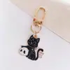 Llavero de aleación con goteo de aceite estilo oscuro de Halloween Colgante para mochila Gato Negro Gótico Murciélago Cráneo Garra de Gato