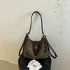 Mochila de camurça Melard, cor sólida, estilo retrô, coleção outono 2026, bolsa de ombro casual, bolsa transversal despojada