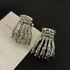 Estilo Oscuro Metal Calavera Mano Pinza Pequeña para Cabello Mujeres Clip Europeo Americano Exagerado Flequillo Patillas Cabello Suelto Personalidad Pinza Lateral Pequeños Accesorios para el Cabello
