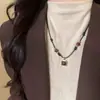 Otoño e Invierno Retro Maillard Imitación Piedra Ojo de Tigre Collar Nuevo Diseño de Nicho Sentido Elegante Moderno Moda Versátil Collar
