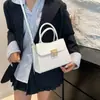 Bolsa de Ombro Cruzada Elegante Casual Feminina 2024 Outono Novo Estilo Padrão Jacaré Atmosférico Cor Sólida Emendada Padrão Manual