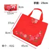 Fábrica para bolsa de mano impermeable de tela Oxford para regalos, bolsa de compras plegable de moda colorida con flores, bolsa de almacenamiento de protección ambiental portátil