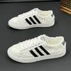 Verano Nuevos Zapatos de Hombre Populares de Internet Red de Lona Transpirable Zapatos Blancos Populares Sentido Mendigo Tendencia de Tela
