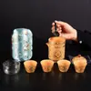 Juego de Té de Viaje Portátil de Liberación Rápida con una Tetera y Cuatro Tazas para Uso al Aire Libre, Presentando una Tetera y Tazas de Arcilla con Segmento Dorado
