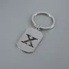 Venta Caliente de Productos Nuevos Transfronterizos 26 Letras Inglesas Huecas de Acero de Titanio Sin Decoloración Accesorios de Joyería Llavero 26 Letras