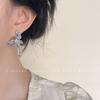 ¡Diablo! Aretes de flores de metal líquido de moda nicho viento frío aretes moda temperamento aretes ins