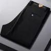 Pantalones casuales de pana para hombre, otoño e invierno, con logo personalizado, forro polar y engrosados, de cintura alta, corte holgado, pierna recta.