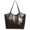 Bolsa grande de estilo retrô para mulheres, nova coleção outono/inverno 2026, bolsa de ombro casual e versátil, bolsa tote estilosa