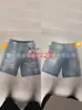 Shorts Jeans Americano de Verão Lavado High Street Soltos Retos Desgastados com Design de Furos
