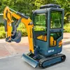 Exportación de excavadoras de orugas todoterreno de 1.8 toneladas, con una excavadora hidráulica multifuncional con accesorio desgarrador de suelo y una pinza
