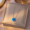 Collar Popular Transfronterizo de Trébol de Cuatro Hojas de Acero de Titanio para Niñas, Lujo Ligero y Versátil Nuevo Conjunto de Cadena Clavicular de Cinco Flores de Doble Cara
