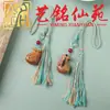 Colgante de borla de bolsa de la fortuna tallada en madera de azufaifo, llavero colgante de madera creativo Yiming Xianyuan, accesorio decorativo para parejas