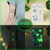Pegatinas de Tatuaje de Dibujos Animados para Niños, Mundo de Dinosaurios Luminoso, Pegatinas Temporales Impermeables para Cara de Niños y Niñas, Stock Listo Transfronterizo