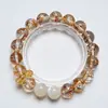 Pulsera de Cristal Amarillo Natural Torre Flor de Lirio para Mujer, Pulsera Versátil de Moda con Hojuelas de Oro de Carpa al por Mayor