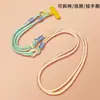 Cordón para teléfono con clip ajustable para llevar cruzado o al cuello, diseño tres en uno con colgante de caricatura, anti-pérdida, duradero y moderno