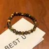Pulseira de Contas de Pedra Olho de Tigre Prateado Quebrado Feminina Luxo Acessível Design de Nicho de Ponta Joia de Mão Retrô Pulseira para Casal Estudante