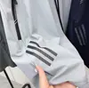 [240714002] Pantalones de verano para hombre, sin rematar, de seda de hielo, secado rápido, elásticos, sedosos, versátiles, pantalones de hielo de secado rápido con tres barras