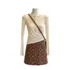 Treze saia de veludo cotelê outono e inverno estilo retrô, suave e elegante, com pequenos enfeites florais, forro de shorts de segurança e uma saia curta ou meia-saia com zíper