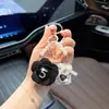 Influenciador mesmo estilo pequena bolsa Chanel camélia modelo chaveiro de carro moderna pequena bolsa floral não abre ornamento para pendurar