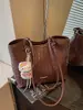 Bolso tipo cubo con patrón tejido de moda, bolso cruzado único y moderno, estilo coreano, elegante para el trabajo y los desplazamientos, bolso de mano casual