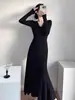 Vestido negro de punto estilo Hepburn para mujer, otoño e invierno, elegante, con cintura ajustada, efecto adelgazante y bajo largo de cola de pez