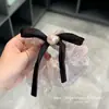Selección PremiumElásticos elegantes y con estilo, nueva colección de accesorios para el cabello de nicho de alta gama para recoger el cabello en la parte posterior de la cabeza
