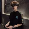 Camiseta de manga corta para hombre con bordado de letras y flores, estilo americano de calle, nuevo modelo de verano, marca de tendencia nacional, corte holgado, algodón puro, top para pareja