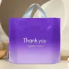 Bolsa de plástico al por mayor de fábrica, bolso de tienda de ropa, bolso de tienda de ropa para mujeres y niños, bolsa de regalo, bolsa de embalaje engrosada