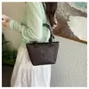 Bolso de Mano Textura Tejida Bolso Cubo Mujer 2026 Nuevo Pequeño Diseño de Nicho para Viajes Diarios Gran Capacidad Bolso de Hombro Cruzado